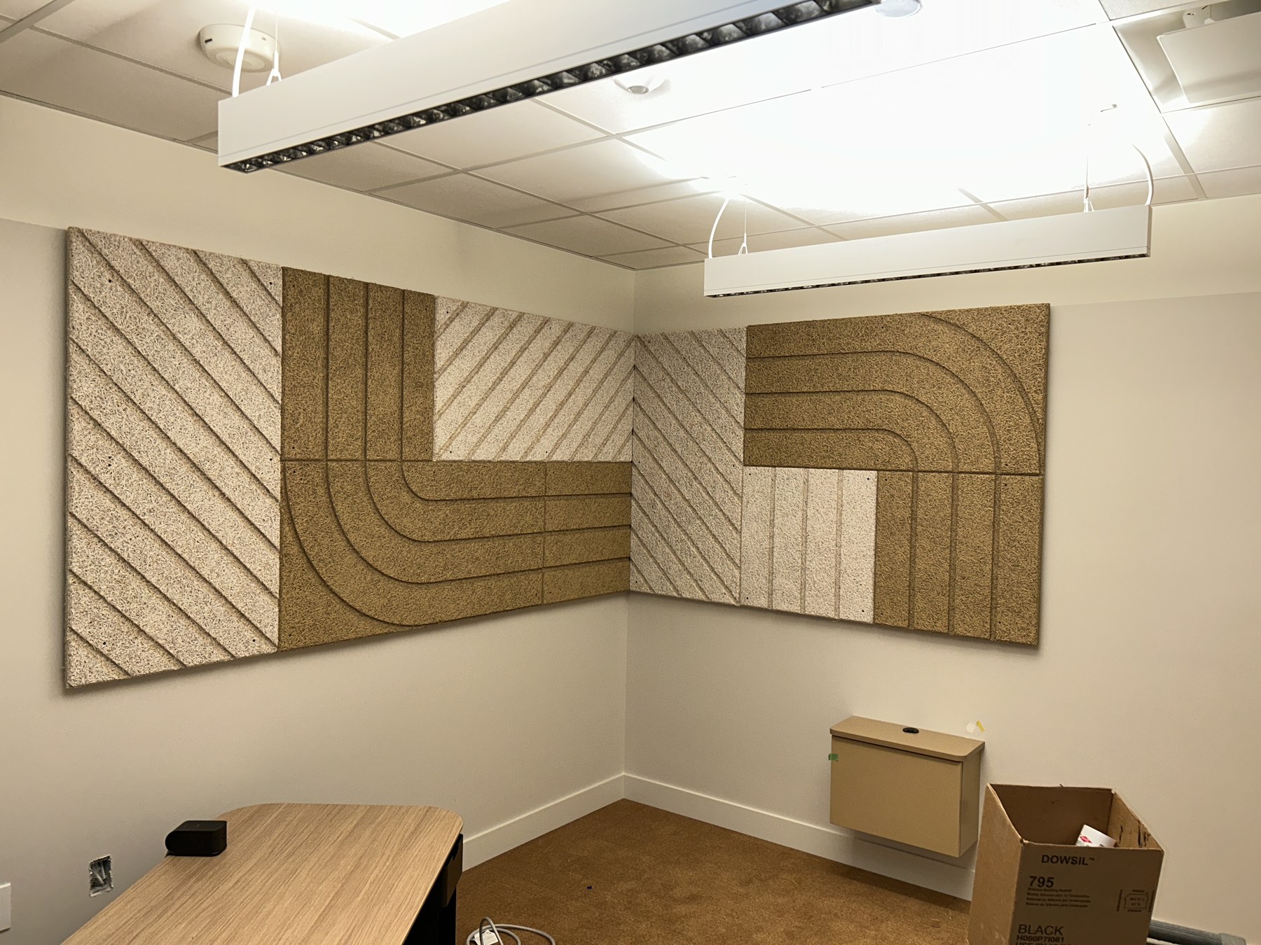 Netflix · Textured wall panels and suspended ceiling during construction