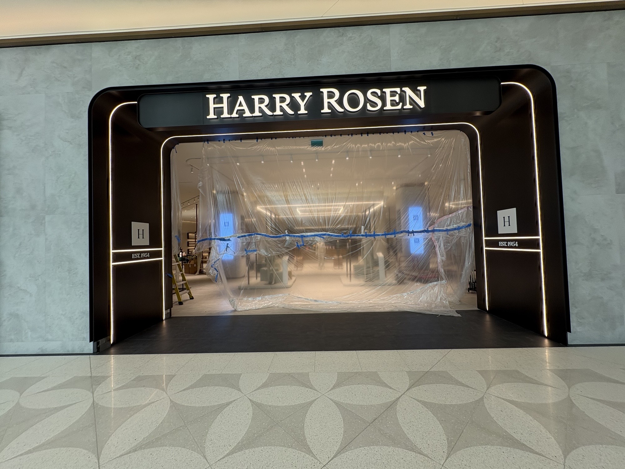 Harry Rosen · Oakridge Park · Storefront during construction