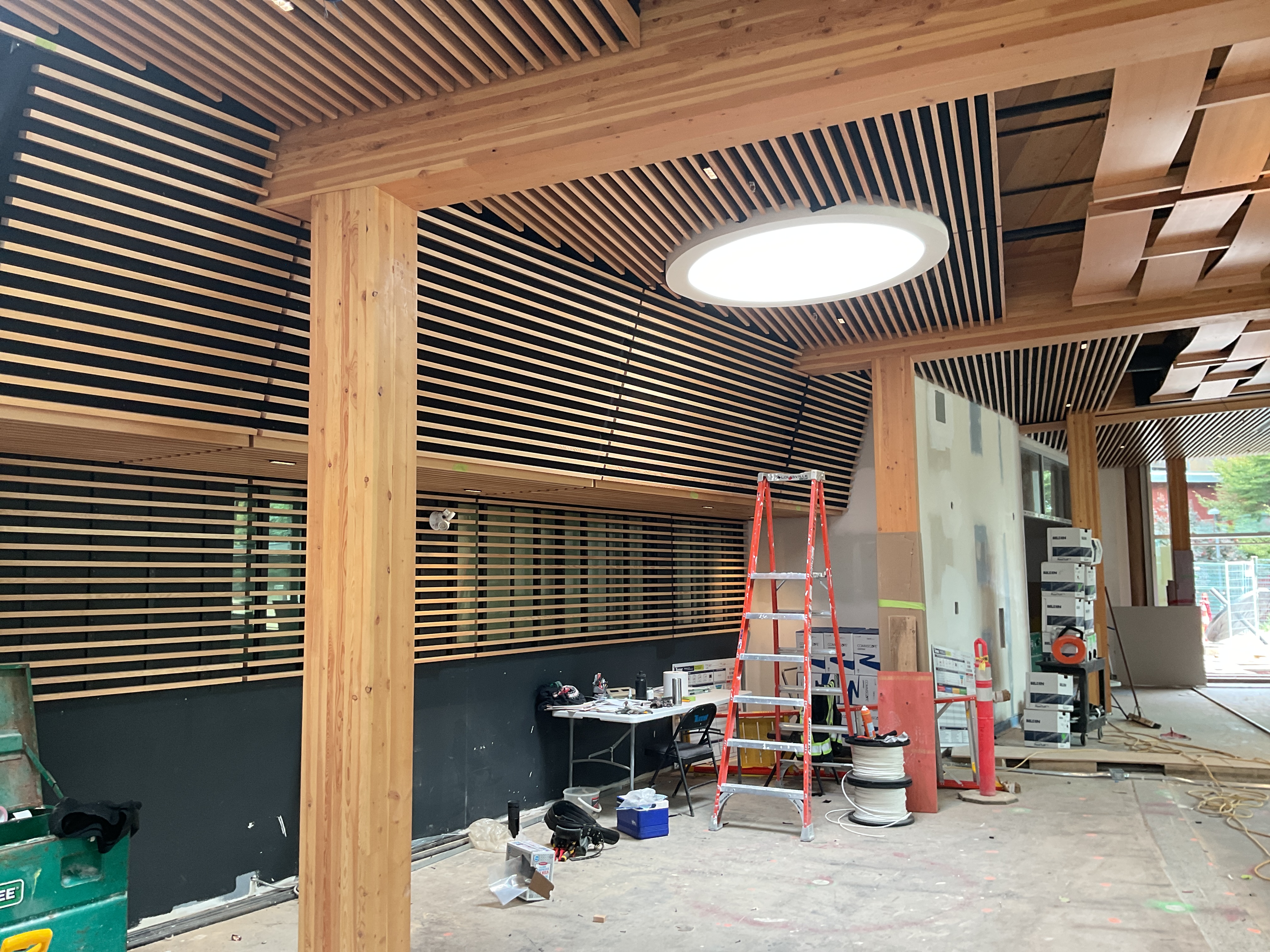 Wall and ceiling details during construction at University of the Fraser Valley Dining Hall