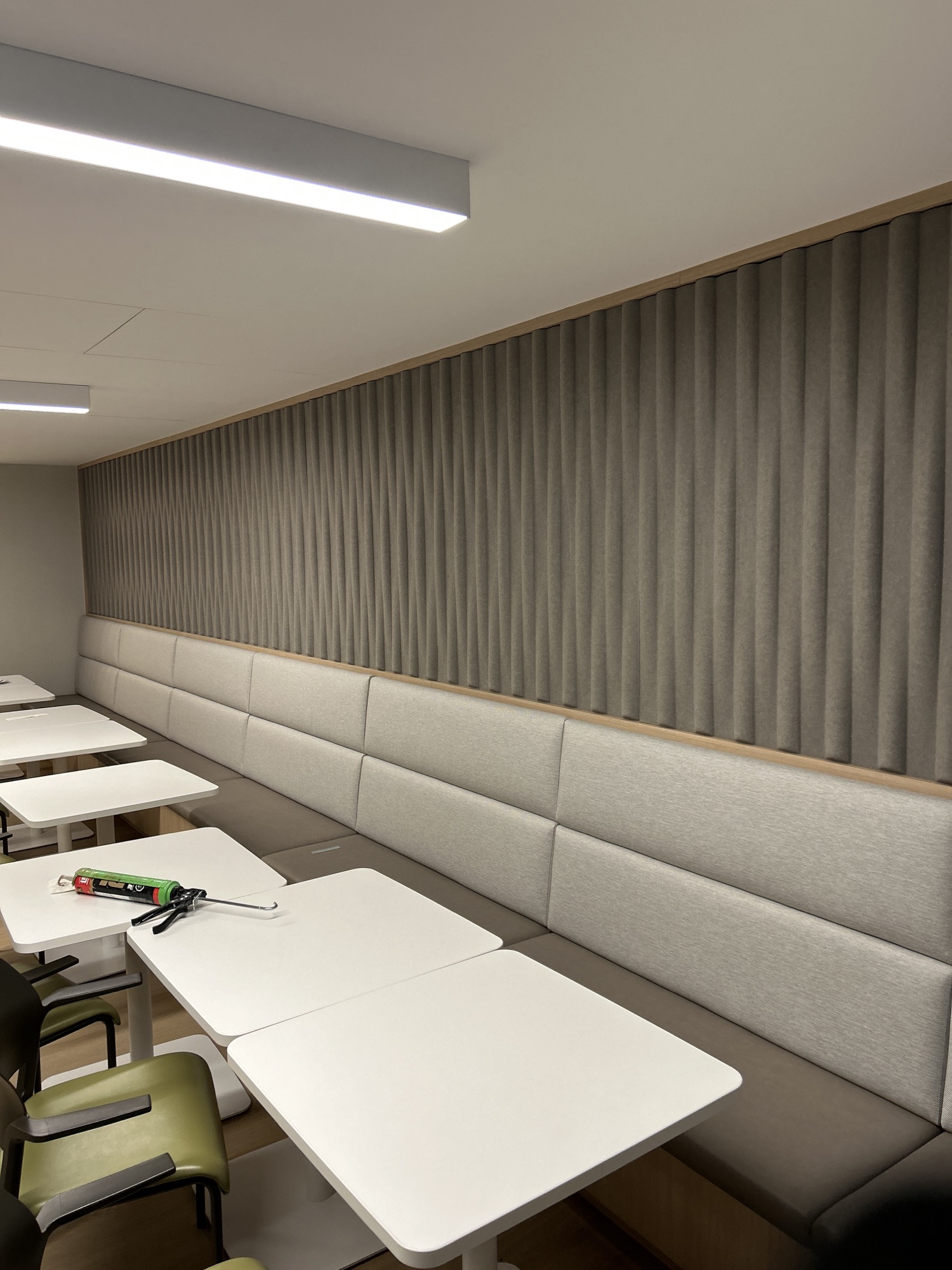 Finished seating alcove and wall finishes at Vancouver DTES UPCC